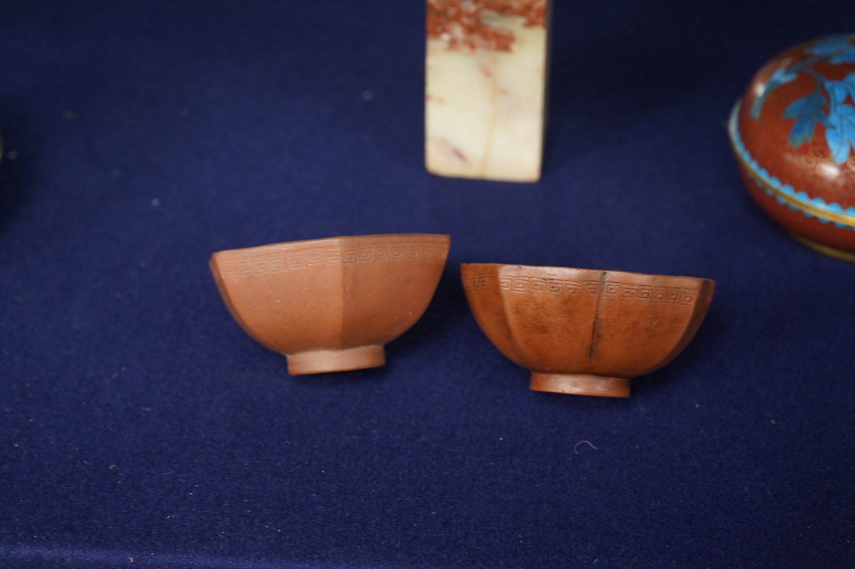 Two 18th century Yixing cups, a Chinese soapstone seal and two covered cloisonne pots, seal 11cm high